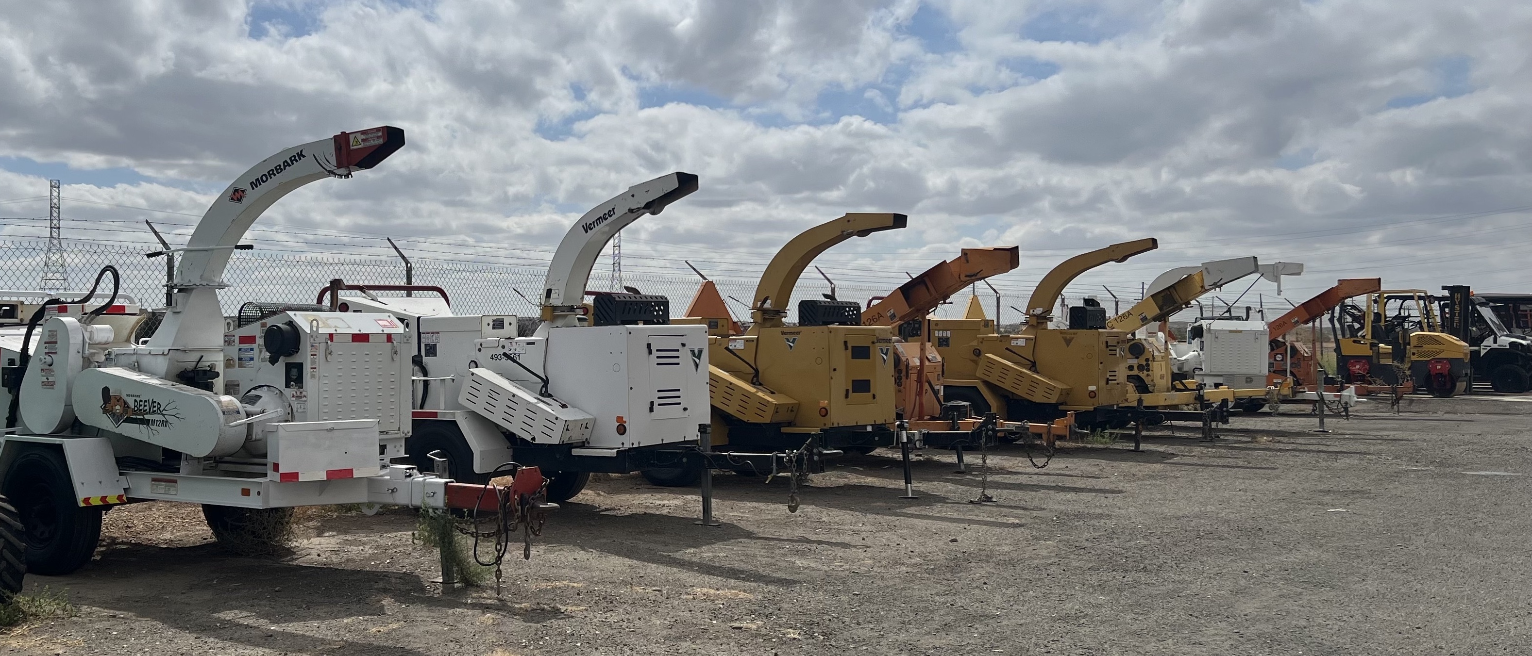 Wood chippers lined up on the yard