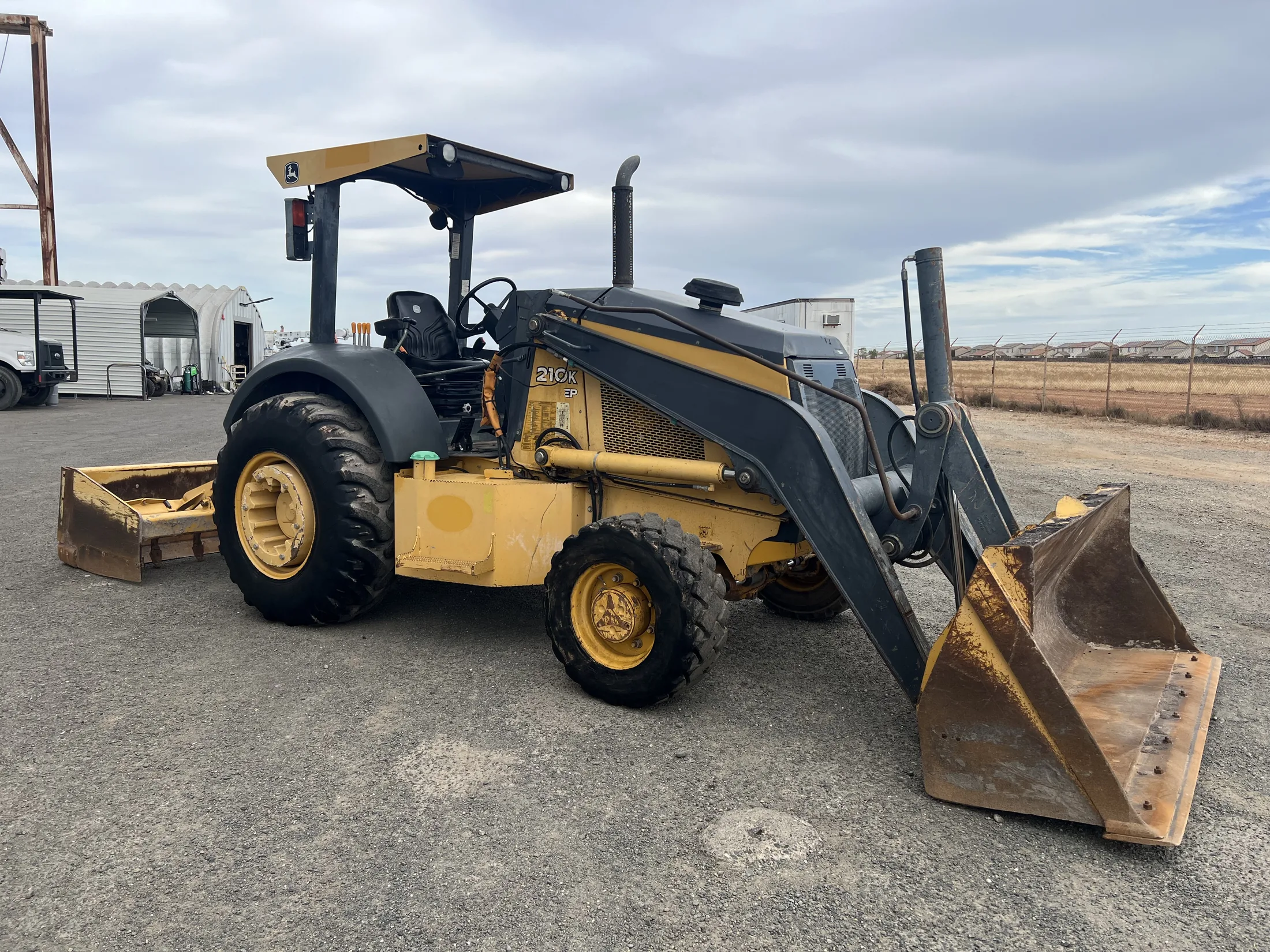 2012 John Deere 210K EP Skip Loader — photo 1